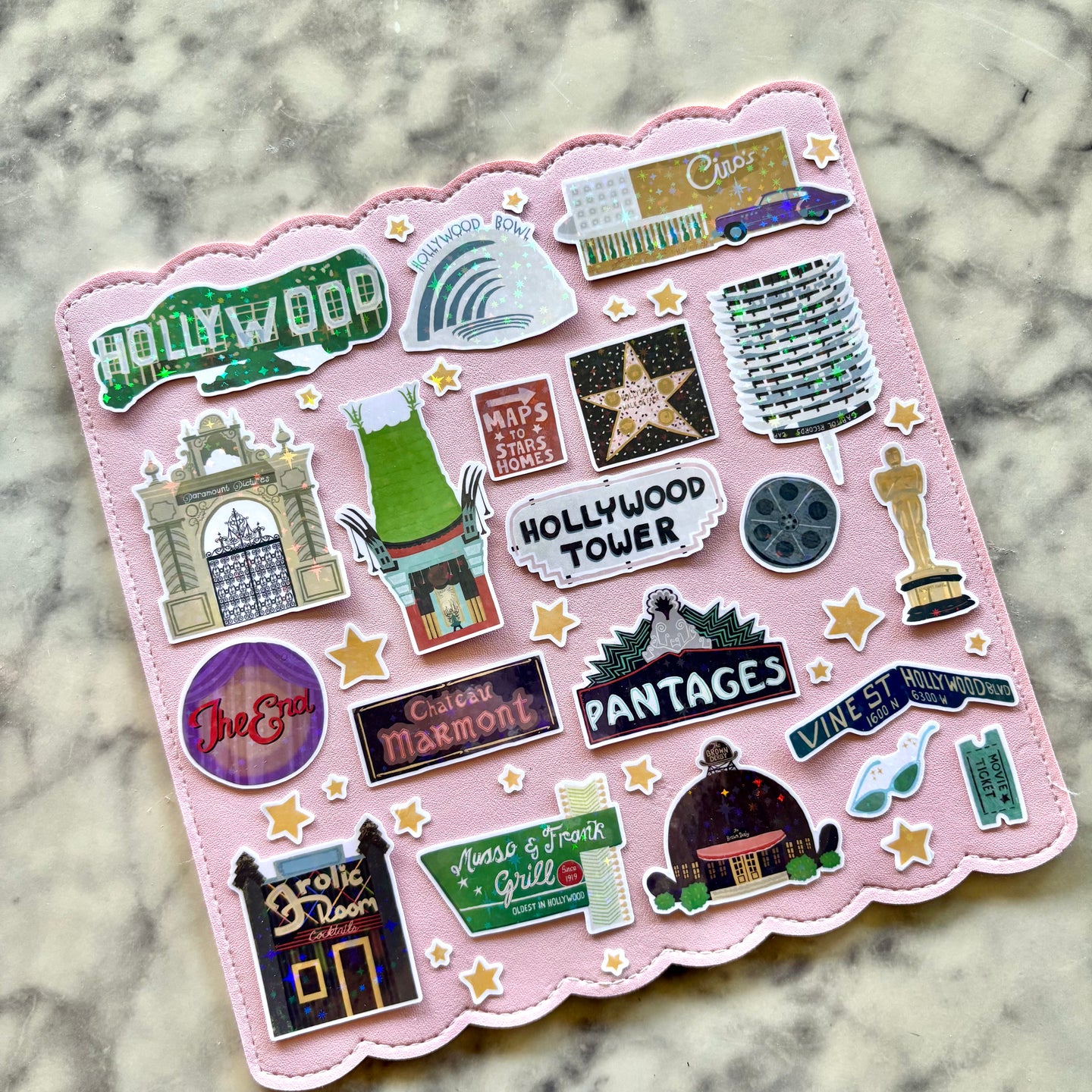 a collection of old hollywood themed stickers that are laminated in a starburst holographic vinyl